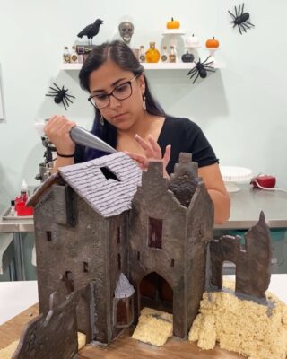 I swear I was really piping when this was taken last year while working on my Edward Scissorhands gingerbread house. 😆 I’m starting on my Addams Family mansion next week!! Check back for my next tik tok. I promise I won’t attempt a creepy voice over again 🧛🏻‍♀️😆 If you haven’t seen those videos- make sure you check em out under my same @

.
.
.

#cookiedecorating #customcookies #timeforcookies #sugarcookies #sugarcookiedecorating #cookiesthatinspire #cookieideas #cookieart #royalicingcookies #cookier #instacookies #cookielove #cookieboss #cookiegram #virginiabaker #novabaker #novamom #dmvfoodie #virginiabakery #virginiabakers #dmvfoodie #fairfaxva #fairfaxvirginia #northernvirginia #dcsmallbusiness #dcfood #halloween #gingerbreadhouse #edwardscissorhands #timburton #gingerbread